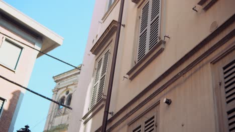 italian city street view with historic buildings