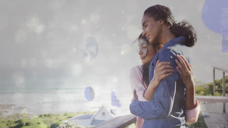 mother and daughter embracing on seaside balcony, with floating business charts and globe icons