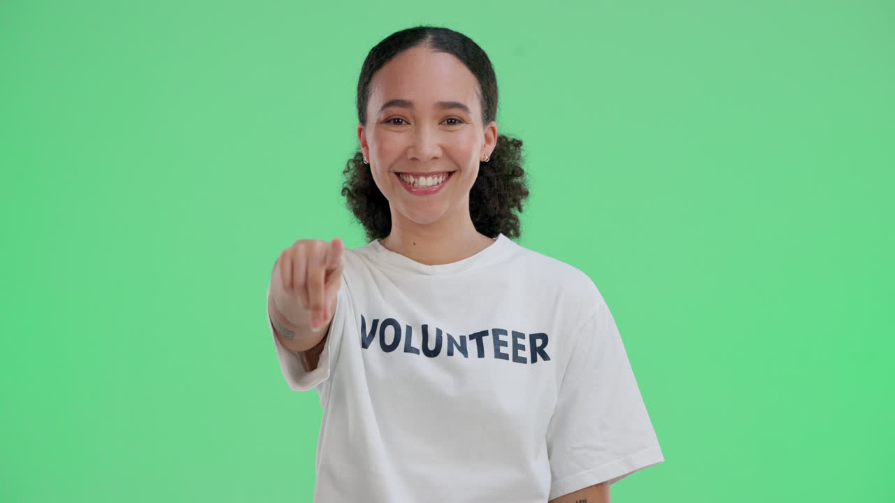 Volunteer pointing at the camera