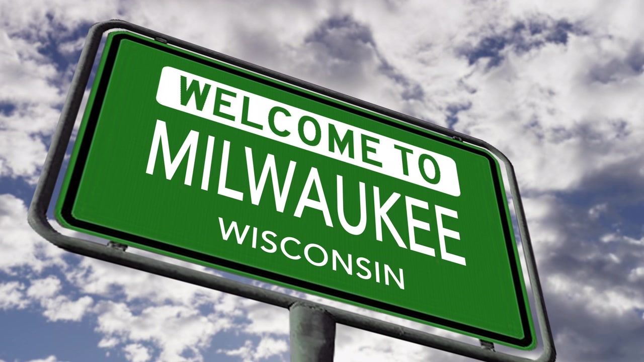 Benvenuti a Milwaukee, Wisconsin. Segnale stradale di città USA. Animazione realistica in primo piano.