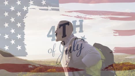 animation of independence day text over african american man hiking