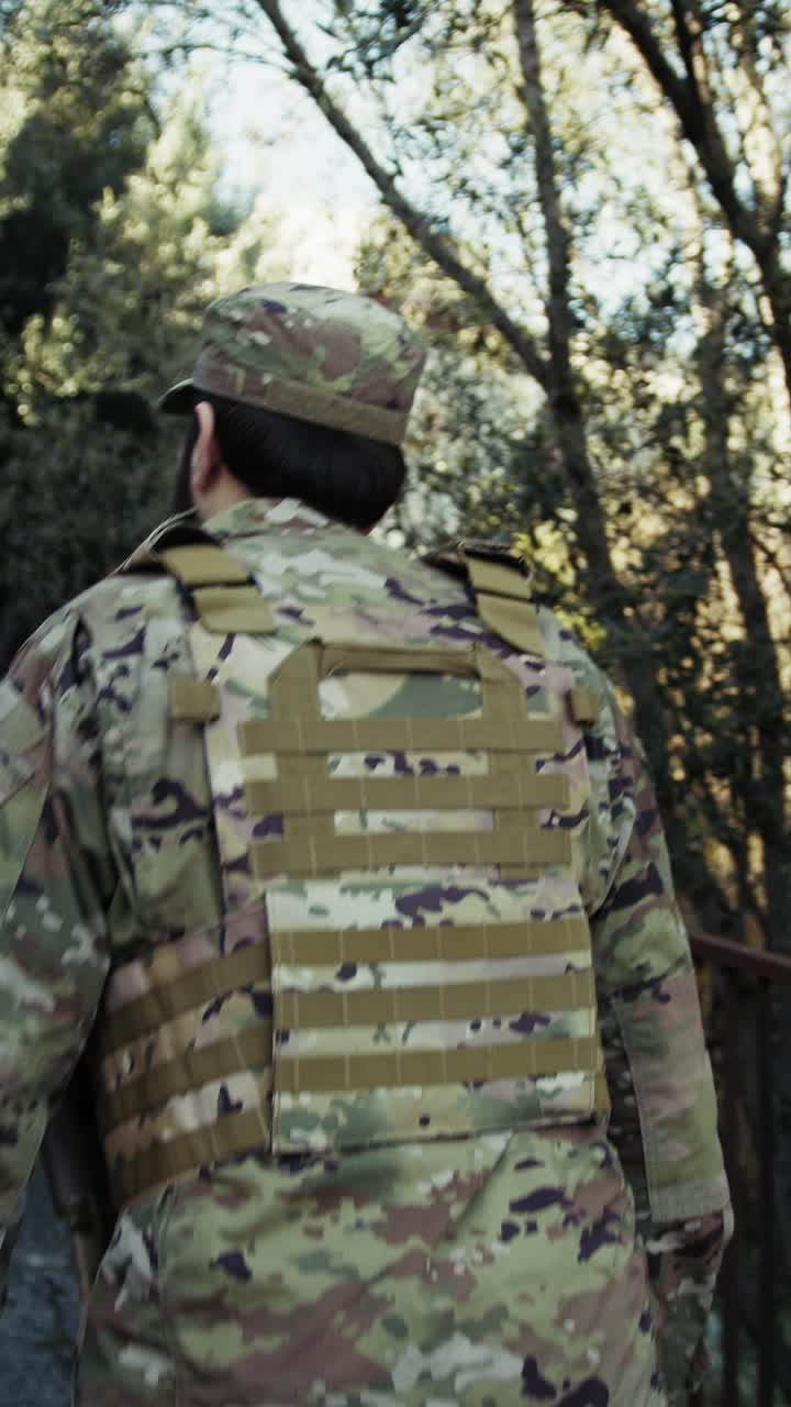 Soldier Alone Climbs An Uphill Road During A Mission