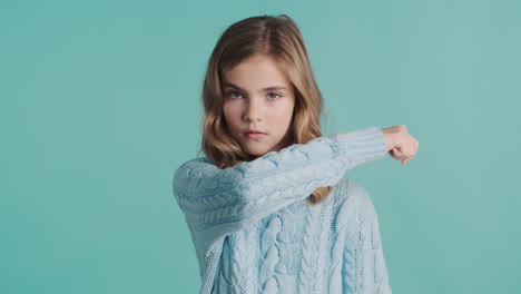 ungry teenage caucasian girl in front of the camera.