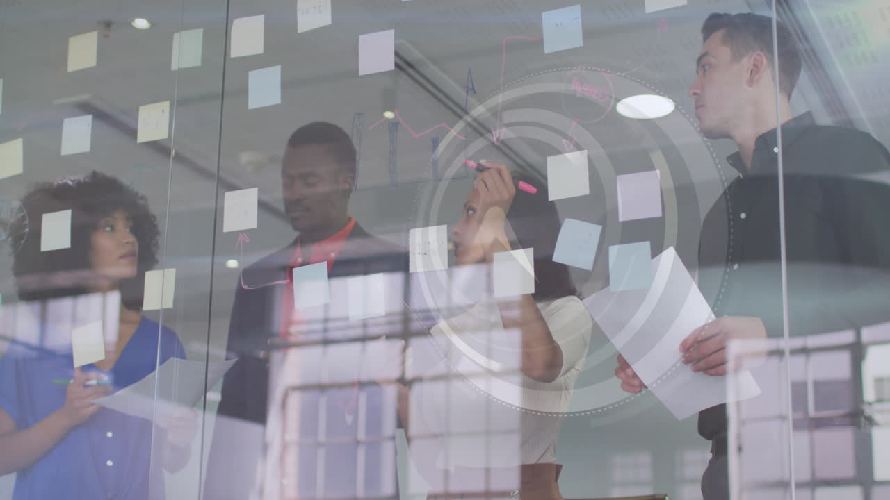 Animation of clock over diverse business people taking notes