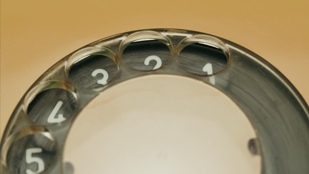 Retro vintage phone, A yellow rotary telephone is displayed on a wooden desk, adding a nostalgic touch