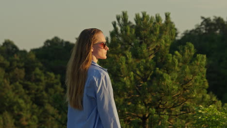 woman wearing sunglasses, standing, fashion, outdoors, nature