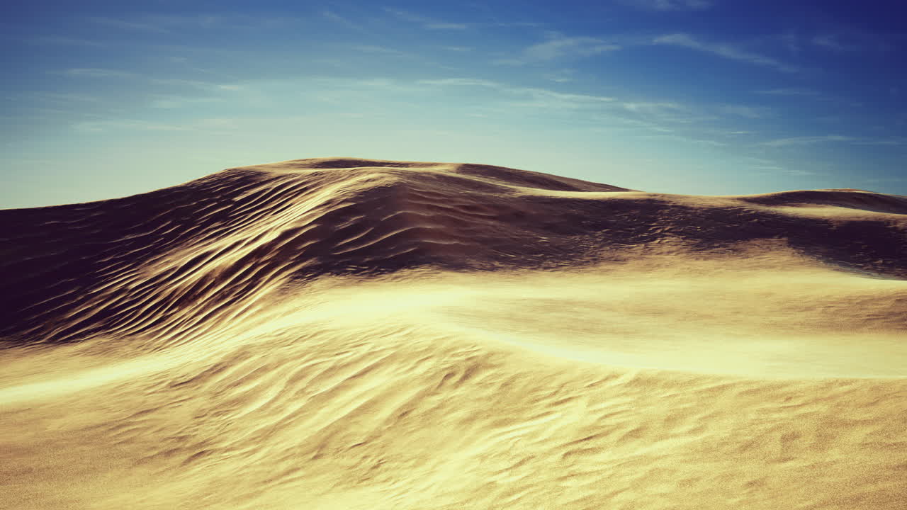 Golden sand dunes ripple under a clear blue sky during midday sun