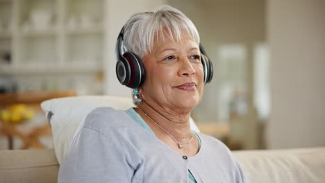 Happy-woman,-senior-and-music-headphones-in-home