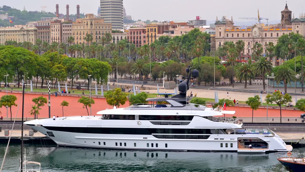 Aerial drone view of boats docked in the Port Vell in Barcelona, Spain