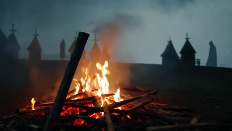 fuego de campamento en el bosque con siluetas espeluznantes y cruces