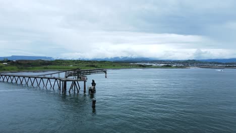 Industrial-structure-protruding-out-to-the-ocean-located-on-an-environmentally-fragile-part-of-coastline