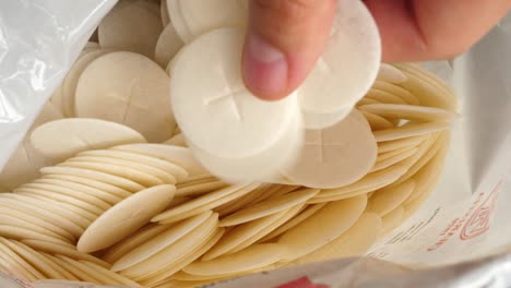 packaging, bag full of communion host communicants