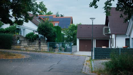 Neighborhood-walk-street-gate-fall-moody-grey-sky