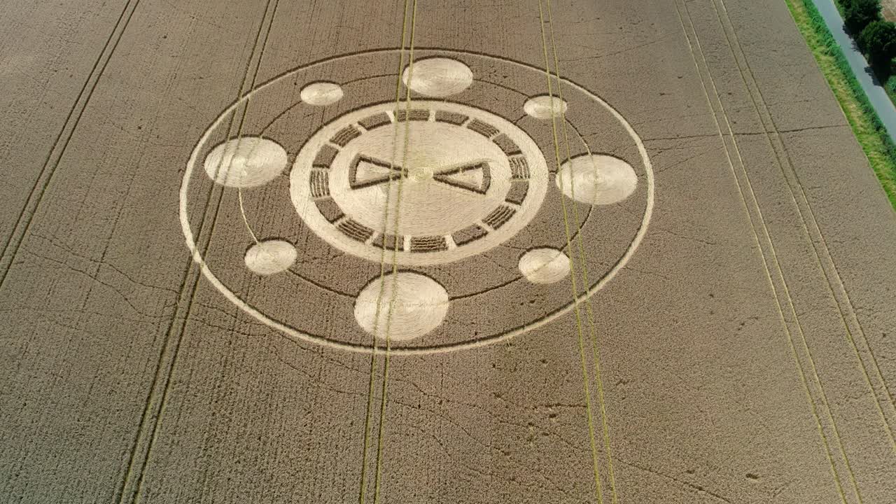 Swarraton barley field strange elaborate crop circle pattern aerial view birdseye above Hampshire countryside