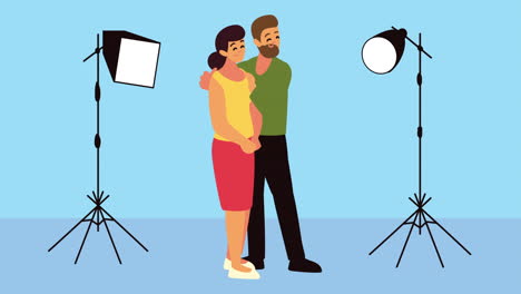 pareja en un estudio fotográfico con lámparas