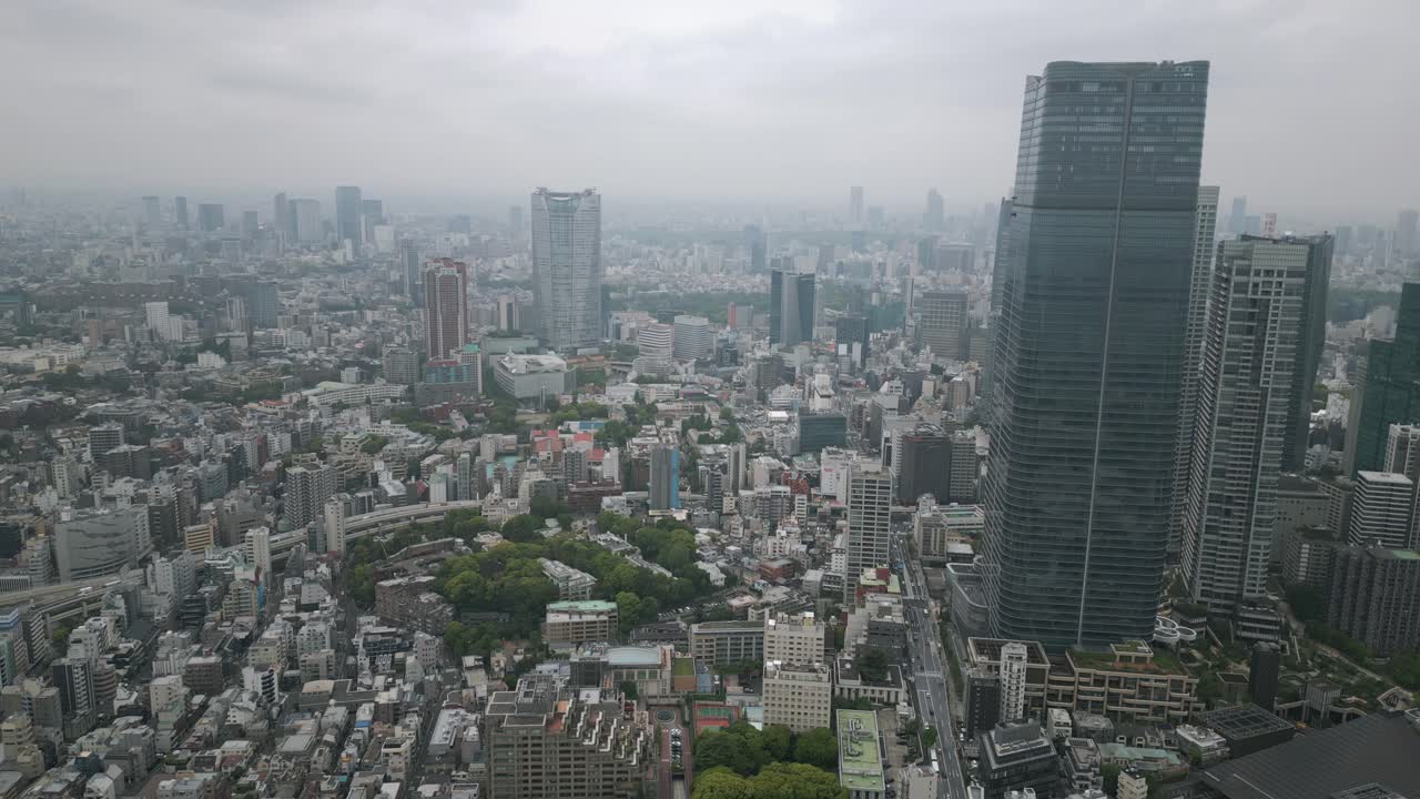 Aerial Scenic Urban Drone Footage of Buildings and Skyscrapers in Downtown Tokyo in the Capital City of Tokyo, Japan