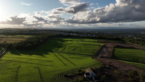 aerial establishing shot of a construction site doing the groundwork to build a large estate of houses