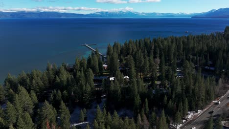 Drone-shot-panning-up-of-Lake-Tahoe-on-a-beautiful-sunny-day