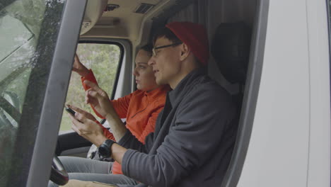 heterosexual couple in a van