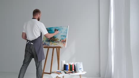super slow motion 240 fps creative artist paints an abstract picture with colorful paints - super slow motion 240 fps, creative artist paints an abstract picture with colorful paints. contemporary works of art on canvas