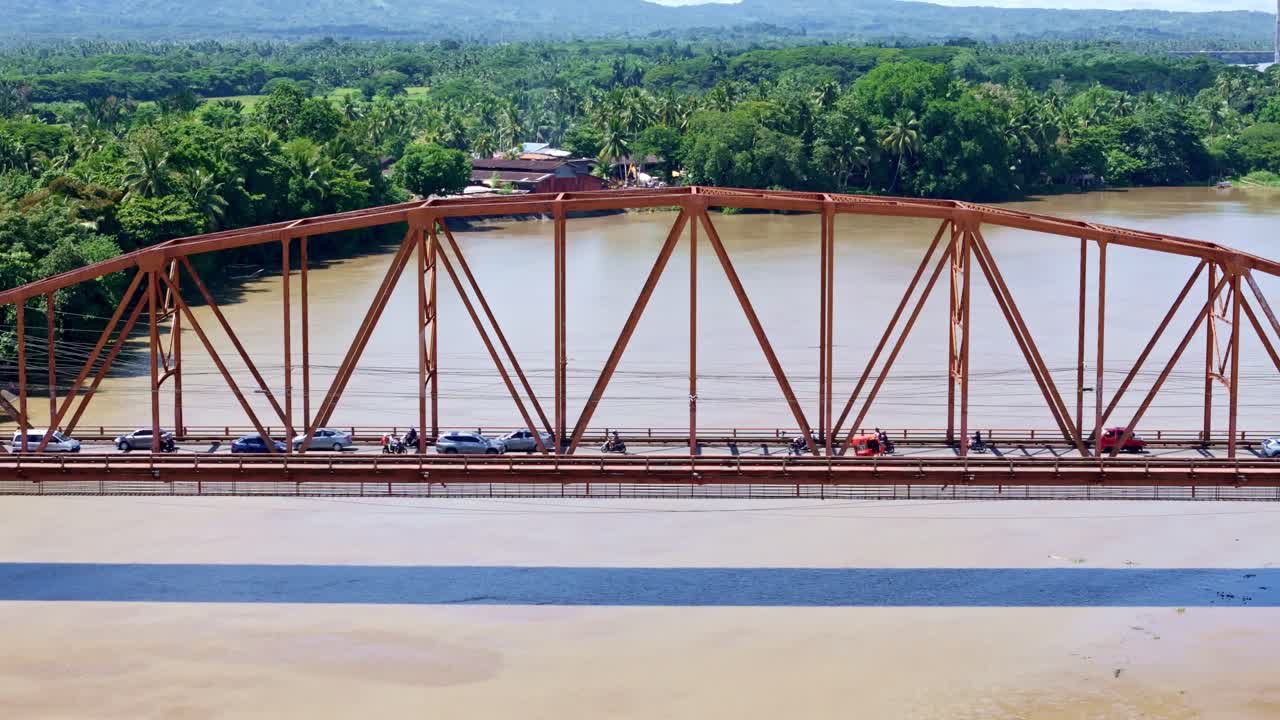 Magsaysay bridge crossing the Agusan River in Butuan City - Establishing shot