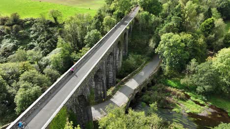 ireland epic locations cyclists stopping to admire the view from durrow viaduct on the waterford greenway between waterford and dungarvan