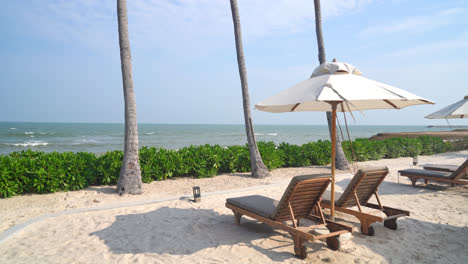 umbrella-with-beach-chair-and-ocean-sea-background---holiday-and-vacation-concept