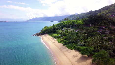 aerial capture of a beautiful beach with crystal clear waters on the brazilian coast