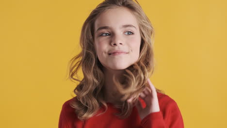 teenage caucasian girl posing in front of the camera.