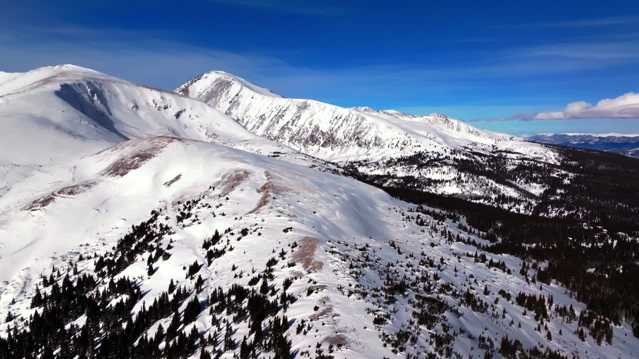 Hoosier Pass Quandary Peak Breckenridge Colorado aerial drone winter high alpine treeline deep snow powder Alma Fairplay Blue River Rocky Mountains morning blue sky 14er January circle right parallax