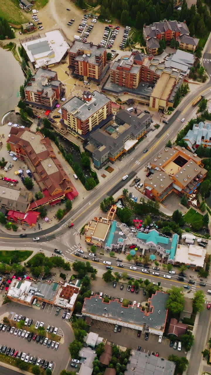 Comfortable cozy town with rural houses, nice streets and parking lots. Beautiful resort city in Colorado, USA. View from top. Vertical video