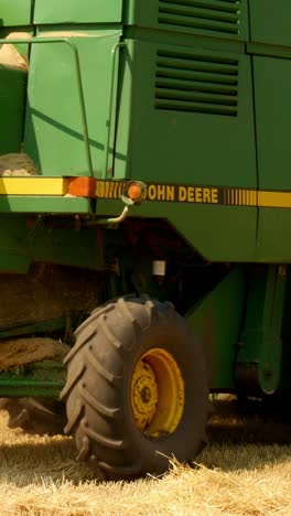 modern combine harvesting grain in the field