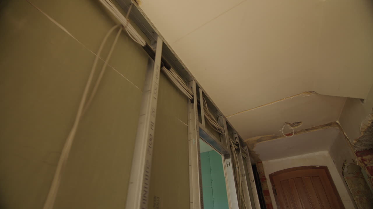 Wide angle tracking shot of a typical german drywall under construction