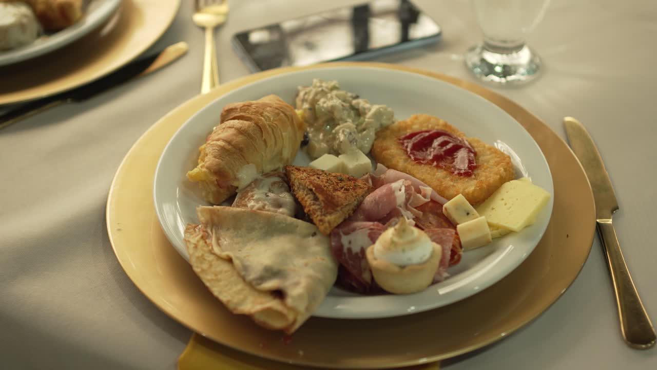 Gourmet breakfast platter Continental Brunch Buffet A hearty platter of sweet and savory delights