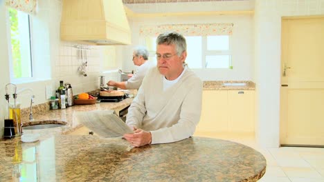 Mature-couple-in-their-kitchen