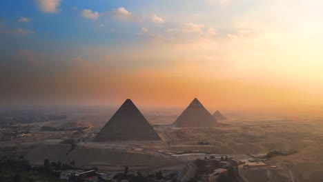 aerial of sunset view over the great pyramids of giza, on the pyramids plateau in egypt, embodies the concept of timeless grandeur and majesty