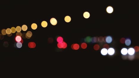 blurred lights of night city life