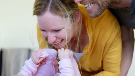 parents playing with their baby boy 4k