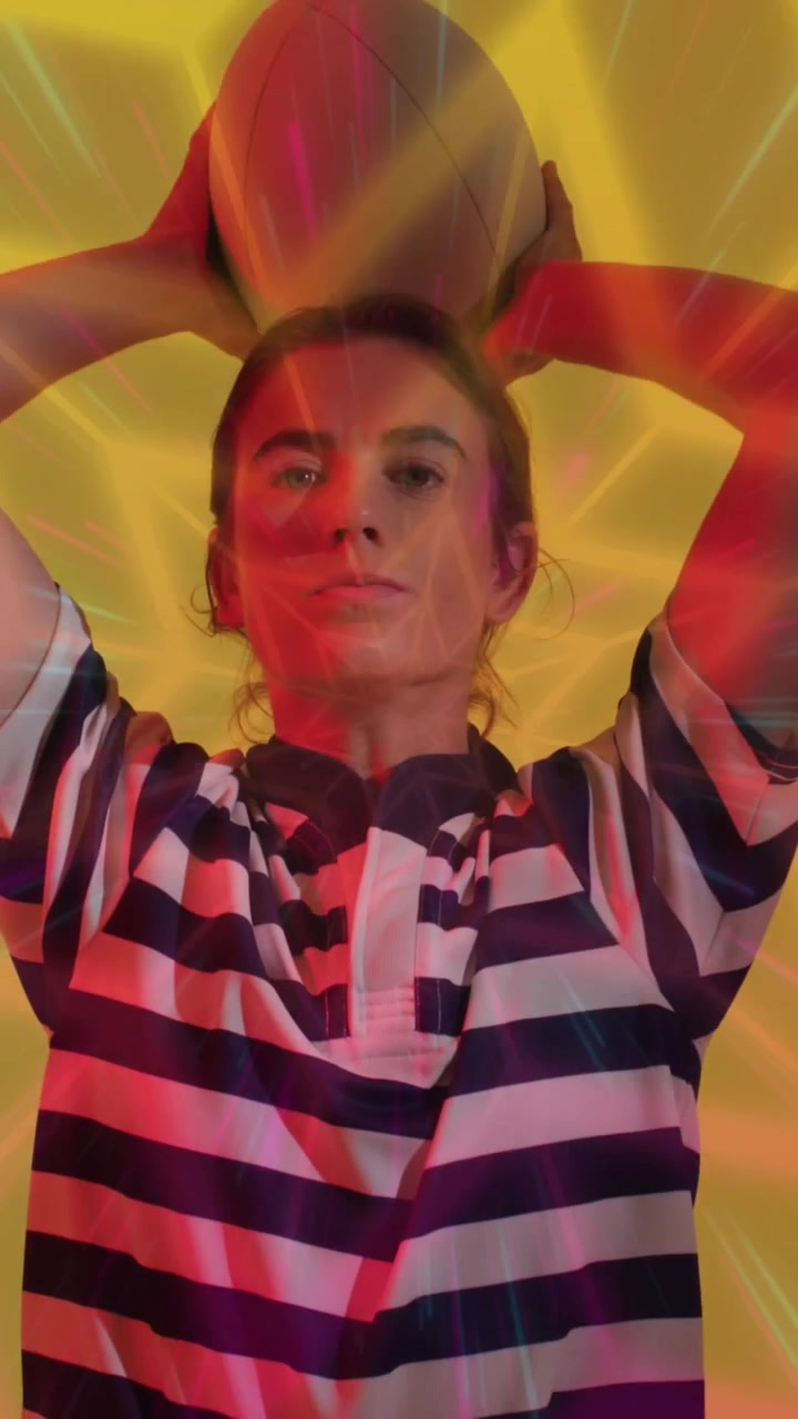 Animation of neon pattern over female rugby player on neon background