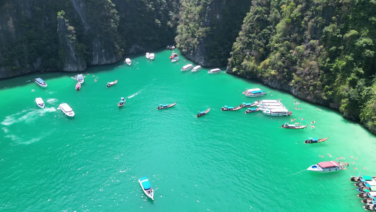 Aerial View of tour boats at crowded Pileh lagoon in Phi phi island