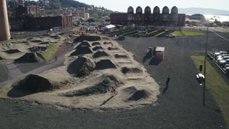 aerial view of cyclists on the biking trail at waterfront pump track in bellingham, washington