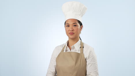 mujer asiática, chef y profesional con brazos