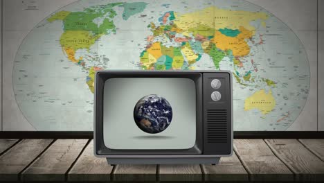 television with a globe on its screen