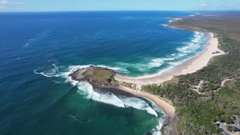 scenic view of angourie point beach and angourie back beach in new south wales, australia - drone shot