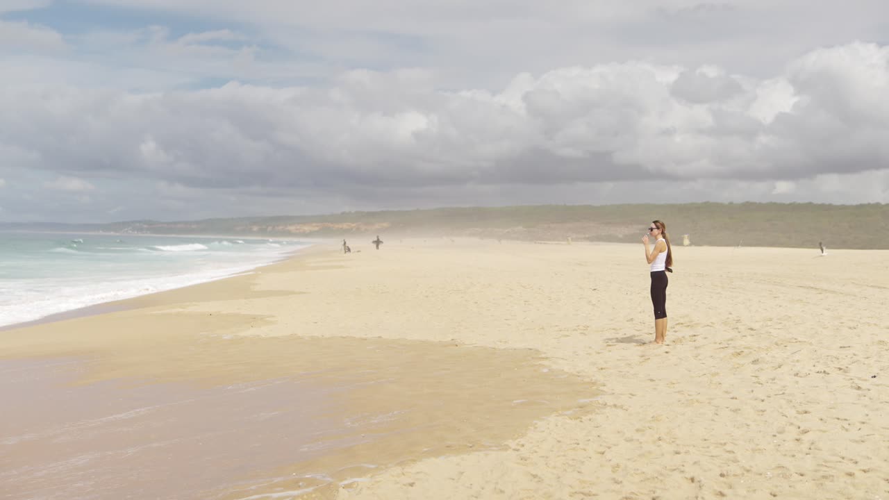 Woman on a Sandy Beach