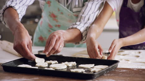 grandparent and grandchild baking cookies