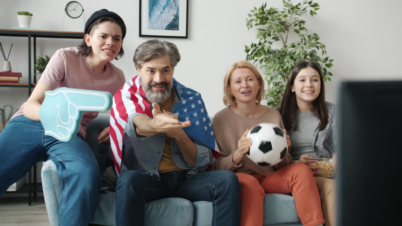 Family Watching Soccer Game
