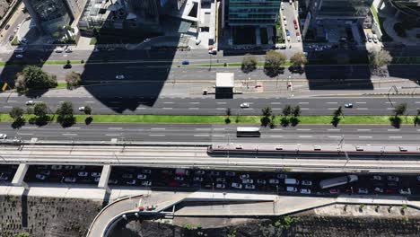 aerial view of city traffic and train