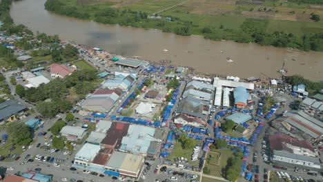 drone view at lundu town during summer, in conjunction of regatta traditional long boat race batang kayan river, with car and bike show.
#regatta