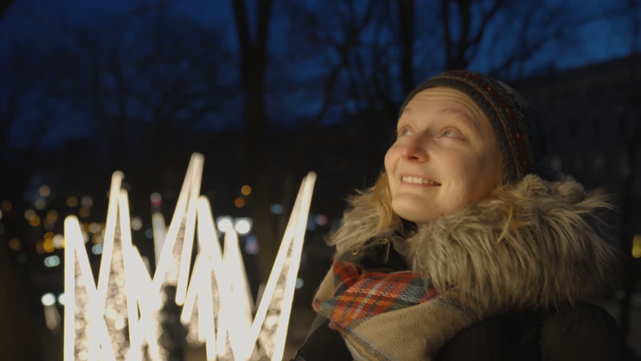 Warm glowing lights of Riga's Christmas market, families enjoying wintertime holiday shopping and decorations